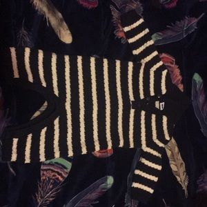 Knitted one piece bodysuit.